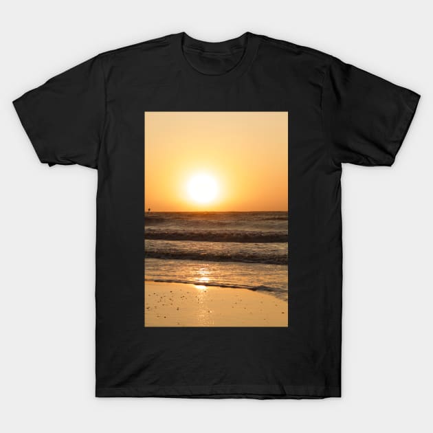 sunset at the beach T-Shirt by stoekenbroek